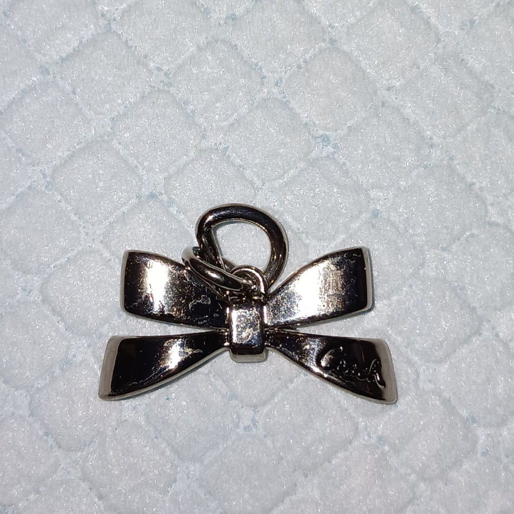 Coach Silver Tone Bow Necklace Pendant